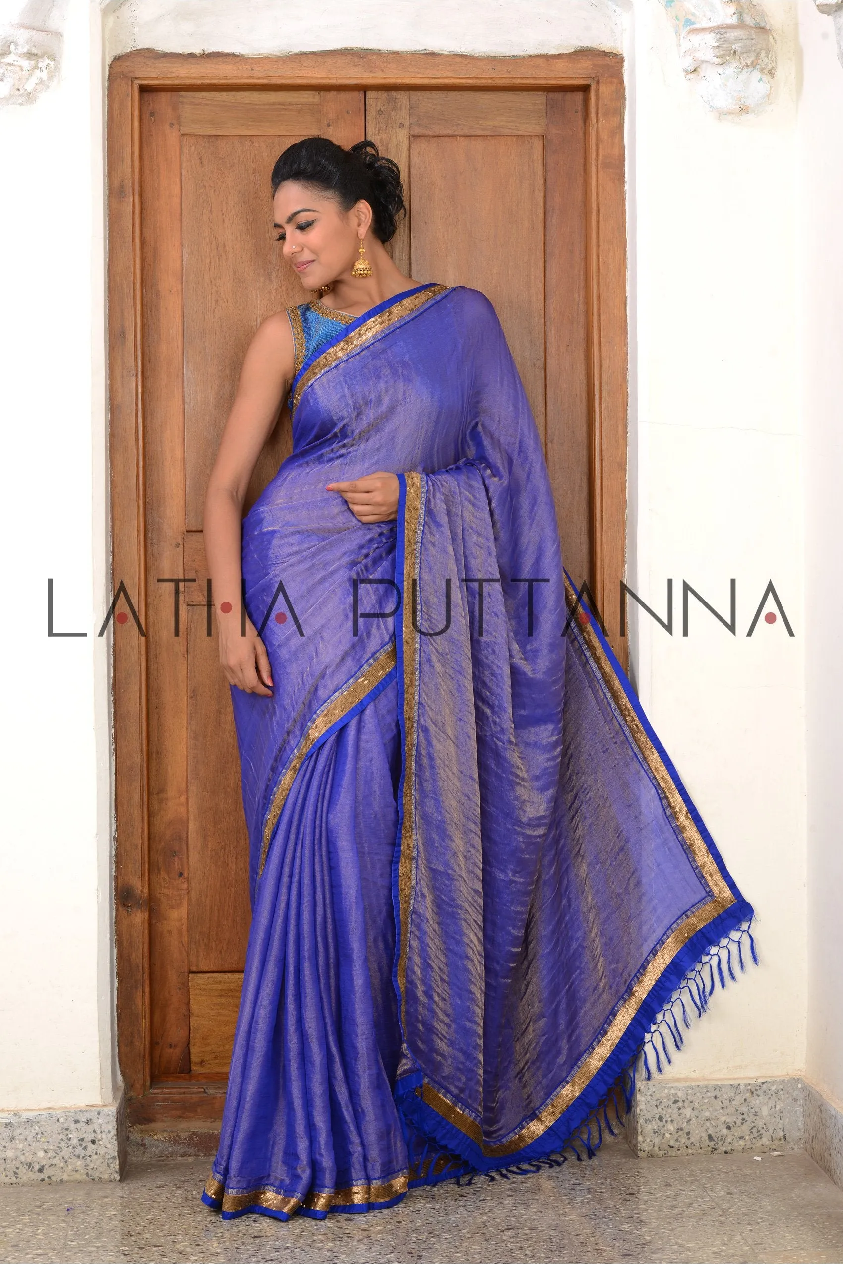 Neelambari - Purple Tissue Saree with Gold Border