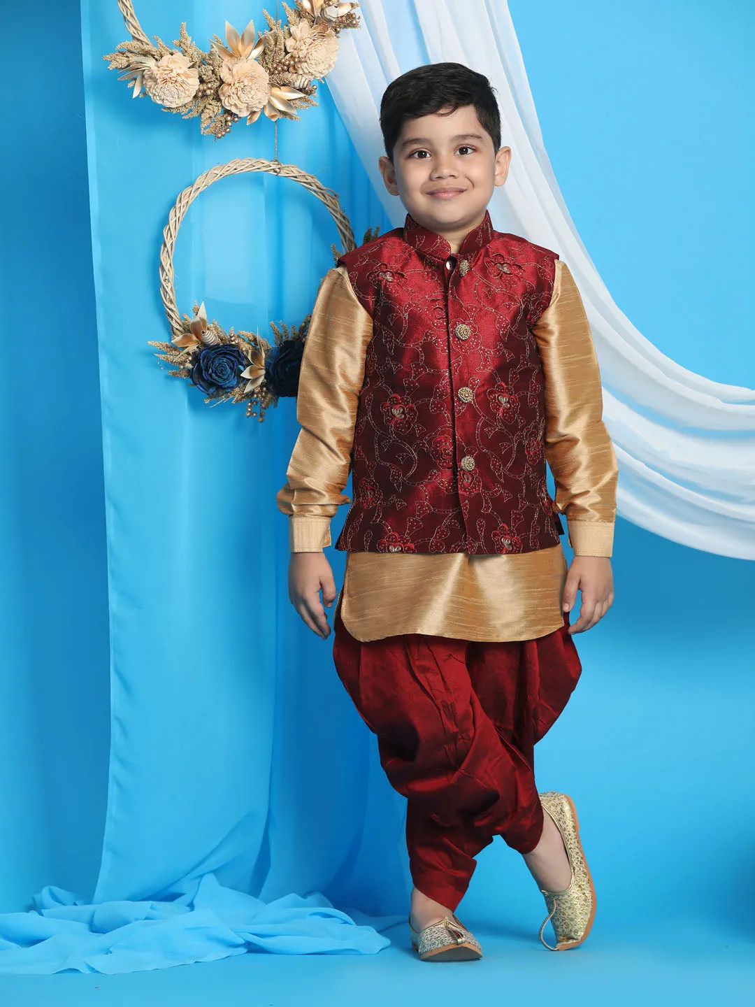 Vastramay Boy's Maroon Embroidered Nehru Jacket With Rose Gold Kurta And Dhoti Set